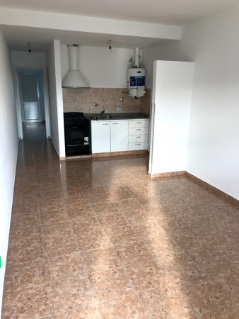 Complejo con 6 departamentos de 1 Dorm con cochera - Calle Neuquen 